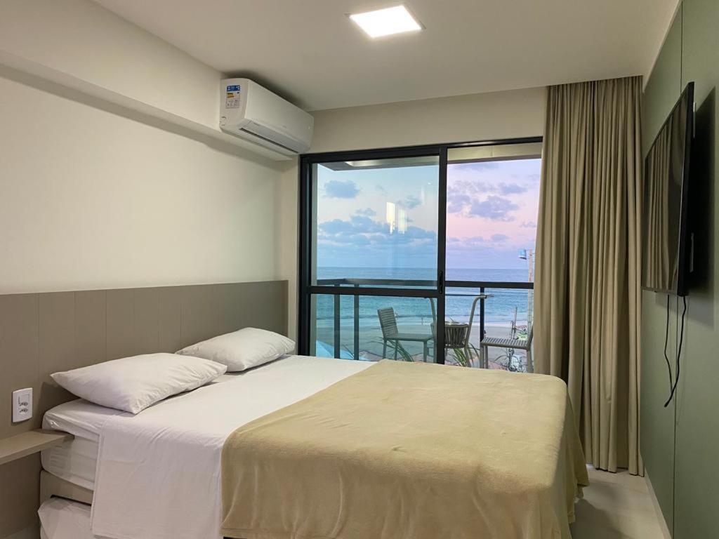 Flat Beira Mar Com Varanda Em Порту-де-Галиньяш Экстерьер фото