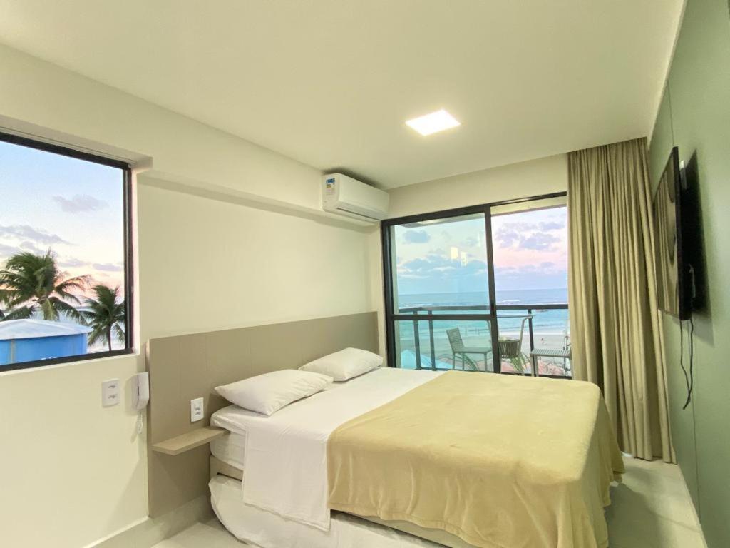 Flat Beira Mar Com Varanda Em Порту-де-Галиньяш Экстерьер фото